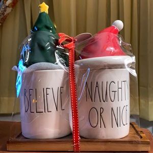 RAE DUNN BELIEVE and NAUGHTY OR NICE canisters on a wood base tree santa holiday